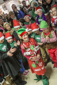 The Champion Elf Ellen Burrell is congratulated by her fellow elf competitors.