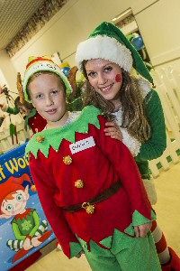 Elf Connor Tinkler, 10, with Chief Elf Harriet Leah Preston.