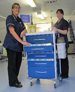 Sisters Chris Corfield and Gill Lloyd at Southport hospital with one of the new drug trolleys.