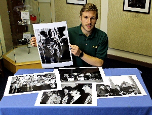 Cuttlestones' Tom Waldron with some of the prints of The Beatles that are set to sell in Wolverhampton on Friday, 16 August 2013
