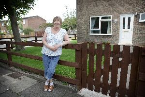 Elaine Albutt outside her home in Southport