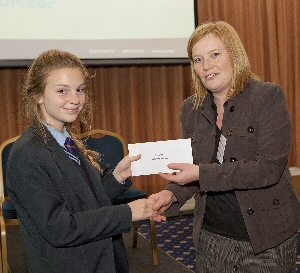 A pupils from Archbishop Blanch received their Outstanding Individual prize from one of the Survitec Judges