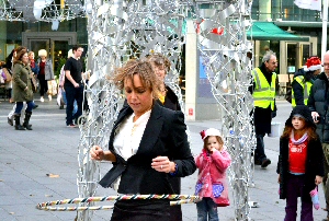 Young Christmas shoppers enjoyed Julia Portsmouth of Hoola Nations performance.