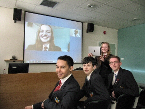 Picture shows Lottie Davies demonstrating video conferencing technology with fellow pupils Oliver Dillon, Cameron Harrison and John Farnworth during their visit to Ormskirk hospital