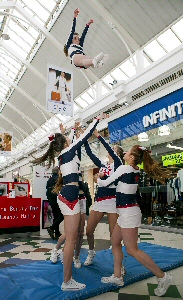 Birkenhead Comets gave an eye-catching display at Pyramids Shopping Centre to raise funds for their trip to America.