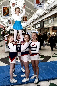 Birkenhead Comets gave an eye-catching display at Pyramids Shopping Centre to raise funds for their trip to America.