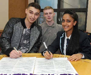 Care leavers sign charter (l-r) Jake Kellie, Michael Binns, Amina Hossain 