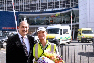Consultant transplant surgeon Sanjay Mehra with Ninette Thomas after she walked 150 miles in 12 days to reach the Royal Liverpool University Hospital.