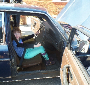 Volvo challenge: Rachel, who attends Stick n Step, had a chance to get behind the wheel of the 240 series Volvo before the team set off.