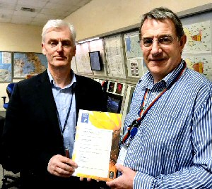 L to R: ATCSLs Chris Kelly and Group ATS Support and Compliance Officer, Andy Brown proudly holding their ISO9001 certificate.