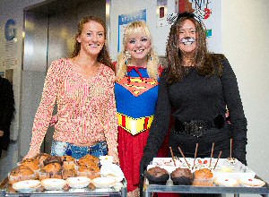 Staff dressed as superheroes held bake sales to raise money.