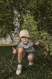 05 Kyle Alasksen, 9 from Bebbington hiding out in the forest.