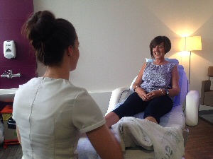 Colette Byrne receives reflexology at the Cancer Wellbeing Centre in the Linda McCratney Centre.
