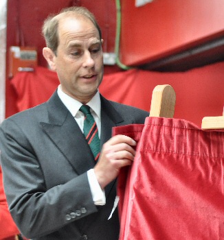 HRH The Earl of Wessex KG GCVO gets ready to show the public the Liverpool Pals Memorial in Lime Street Station.