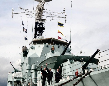 The oldest surviving D-Day brothers, Johnny & Ernest Dale, waving from the deck of HMS Cavalier at The Historic Dockyard Chatham.