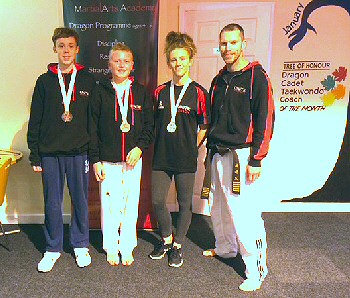 From the left, Joe Dove (Silver), Jake Cribb (Gold) Eliie Mawsdley (Silver) Master Thomas (Team Coach) 