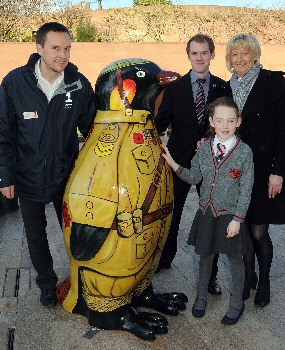 Penguin 4: (L-R) Chris Lee from Liverpool One, Cllr Mark Norris, Jan Calland from LMH with Matilda Ashworth (foreground) with the Go Penguin