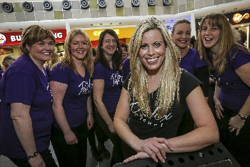 05: Emma Nowell is pictured (front) with several members of her PopVox choir.