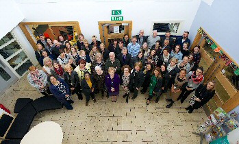 Director of Children's Services Colette O'Brien and Assistant Director Bernie Brown (front centre) with some of Liverpool's 190 children's social workers, who support around 970 young people in care