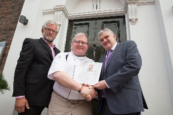 � Pictured: Paul Askew receives the accreditation from Chris Brown (right) of Marketing Liverpool and Mark Loynton (left) of Taste Northwest.