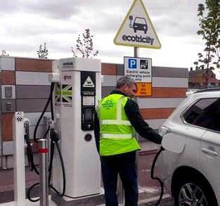 Keith Hollings of DC Emergency Systems Limited who are the Airport�s LED energy saving lighting contractor recharging his Mitsubishi Outlander plug in hybrid car at LJLA