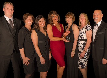 Picture shows members of the Trust cancer services team who won a Team of the Year title at the Trust�s annual staff Pride Awards in June. Dr Paul Mansour is pictured right. Please credit image to �Baker Lodge Studios�.
