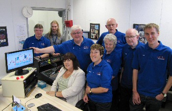 Picture shows Cllr Doreen Stephenson, Mayor of West Lancashire 2014/15 (seated), with station manager Bill Jarvis, Eric Phipps from the Trust IT team and Radio Heartbeat volunteers