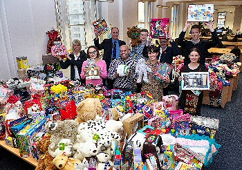 Chief Executive Ged Fitzgerald (back row, far left) with charity champions and representatives of organisations benefiting from the Christmas Gift Appeal.