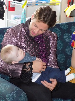 James Hill, star of Snow White, with the children, parents and staff at Zoë’s Place Baby Hospice in West Derby.