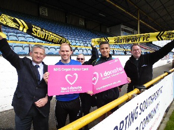 Photo caption: Trust staff are pictured with Southport FC player Jamie Allen (centre-right) and Neil Skidmore, the clubs Health Fitness and Match Analyst.