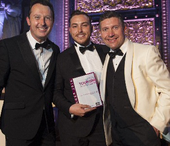 From L-R – Compere at the Liverpool City Region Tourism Awards 2016, Andrew Dickens, pictured with Josh Boyd from Orb CIC and Andrew Dwerryhouse from Wild Thang who sponsored the award.
