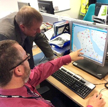 Photo caption: Wirral Council Highways Manager, Rob Clifford, demonstrates the new online roadworks mapping system to Cllr Stuart Whittingham