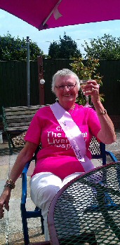 Photo caption: Barbara celebrating following Steves first fundraising ride from Liverpool to Leeds