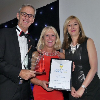 NWC AHSN Chief Executive Dr Liz Mear is pictured with the Supplier of the Year Awards 2015 winners Lee and Helen Townsend from NHS Blood Bikes, Lancs and Lakes