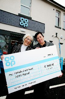 Co-op Store Manager Helen Horsley supporting the Christmas lights with Councillor Denise Dutton 