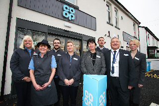 L-R : Kelly Wright, Eileen Scarsbrick, Jack Sefton, Lisa Weatherby, Helen Horsley, Ronnie Mann, Mike Clegg and Jean Marie Hughes at the opening of the new Co-op store in Formby