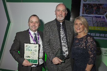 The pictures shows, from left to right: Derek Cartwright, NWAS Chief Executive, with Stuart Rankine, NWAS Vehicle and Equipment Manager, and his wife Ruth.