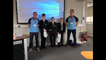 Year eight pupils from Mosslands School (who were runners up for the best team during their STEM workshop): Joseph Ryan, Joshua Pritchard and Finlay Joyce ? pictured with Flight Sergeant Mick Brooks (left) and Flying Officer Cameron-Johnson (right).