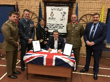 Photo attached  Metro Mayor Steve Rotheram (seated centre) signs the Liverpool City Region Armed Forces Covenant with (from left to right) Lieutenant Colonel Tim Gould - Commanding Officer 156 Transport Regt, Squadron Leader Lee Rimmer - RAF Woodvale, Commander Judith Barnes - HMS Eaglet, Colonel Ray Hughes - Headquarters NW, and Veterans HQ Chief Executive Bob Blanchard.