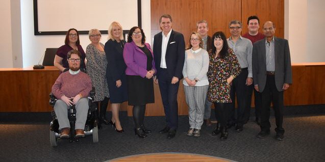 Lynn Collins, chair, and Steve Rotheram, Liverpool City Region Metro Mayor, (centre) pictured with the Fairness and Social Justice Advisory Board.