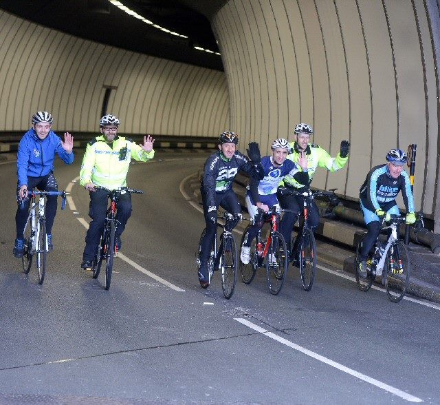  (left to right): Daniel Holdsworth of Merseyside Police and the Safer Roads Team; Dave Parry, Bike Factory  Official Event Mechanics; Mark Sandamas, Director of Pennine Events Ltd; Graham Ward, Thatto Cycles/Bikes you Like  Official Event Mechanics; Tri for Life Team