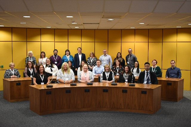 Steve Rotheram, Liverpool City Region Metro Mayor (back row, centre), pictured with the 24 Households into Work advocates.