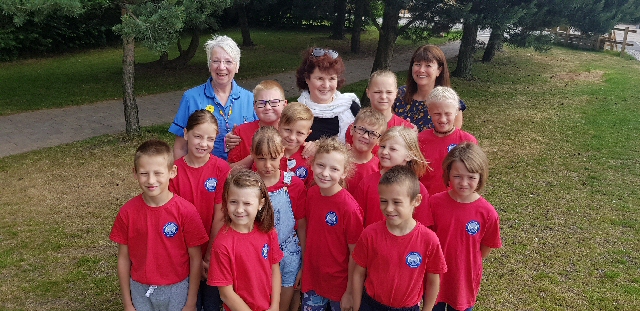 Picture shows children with Dr Gardner, centre, Zena Haslam, left, and Gill Goudie, Maghull and Ormskirk branch of the Friends of Chernobyls Children.