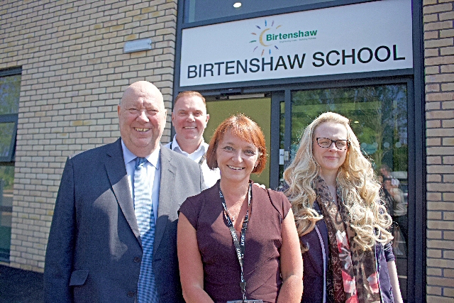 Mayor of Liverpool Joe Anderson outside the new Birtenshaw School with Birtenshaw Chief Executive David Reid, Deputy Chief Executive Julie Barnes and Head of School Stacia Pettersen.