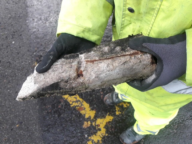 Piece of loose concrete removed from the flyover.