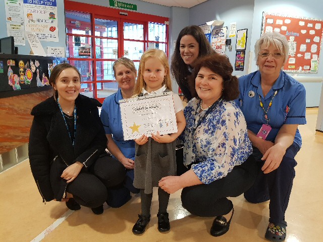 Pictured, from the left: Emily McDonald, Research Support Assistant; Moira Morrison, research nurse; Olivia Isherwood; Eric Isherwood; Dr Sharryn Gardner; Zena Haslam, research nurse. 