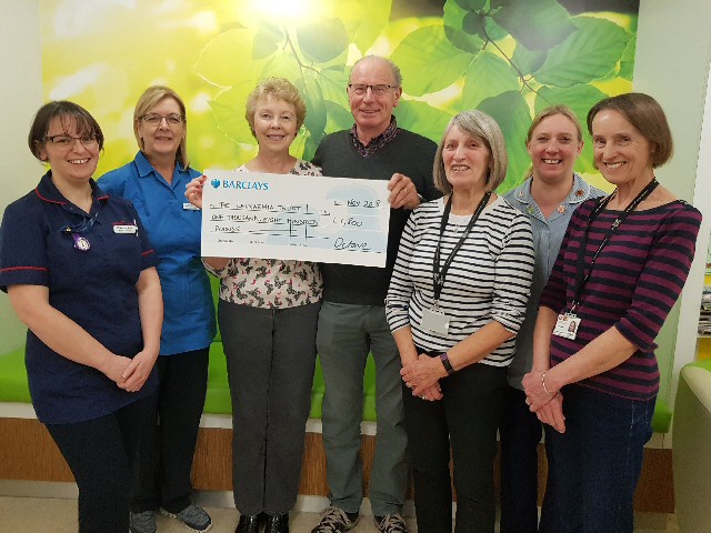 Picture shows Colin Pomphrett and his wife, Brenda, with the cheque.