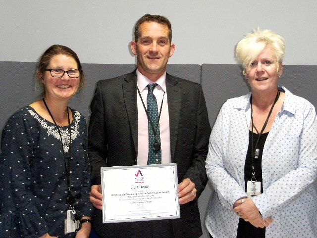 Pictured with the NAS award are Katie Roscoe (Operational Manager of SENISS), Alastair Youdan (Specialist Support Services Team Manager) and Alison Woodburn(Operational Manager of SENISS).
