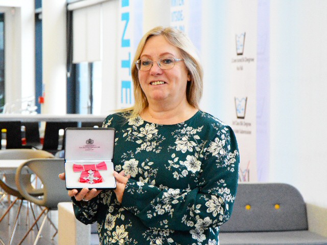 Sandra Clelland with her MBE