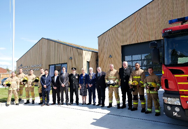 Representatives from Wates Construction, Chief Fire Officer Phil Garrigan, Wirral mayoress Barba Smith, Wirral mayor Cllr Tony Smith, Chair of MFRA Cllr Les Byrom and Station Manager Bill Shepherd with Saughall Massie's White Watch crew.